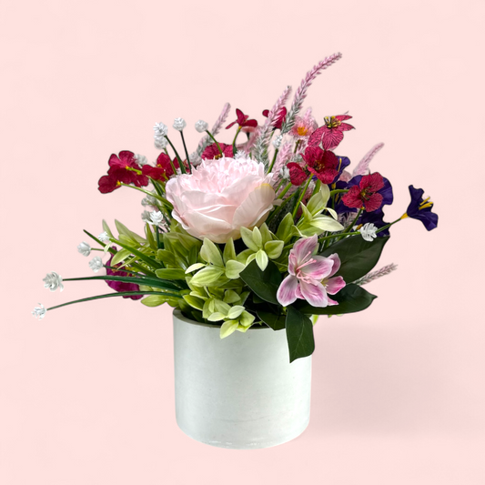 Blushing Bloom – Pink & Purple Faux Floral Arrangement in Cement Planter