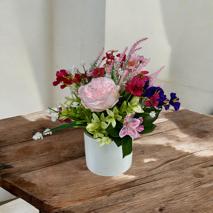 Blushing Bloom – Pink & Purple Faux Floral Arrangement in Cement Planter